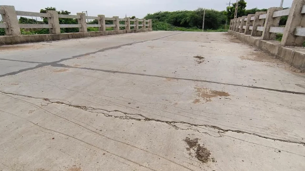 Damaged concrete bridge between Bakarthali and Latuda village in Wadhwan